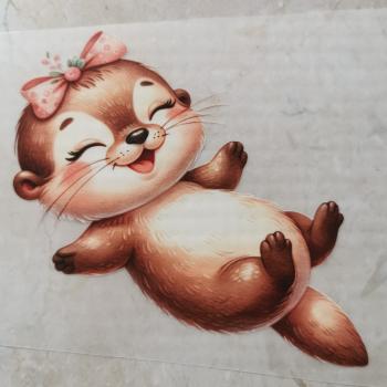 Bügelbild knuffiges Ottermädchen schwimmend