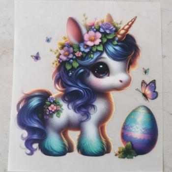 Bügelbild Ostereinhorn viele Schmetterlinge