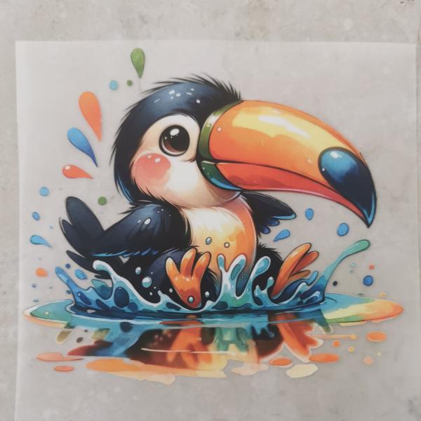 Bügelbild süßer Tukan Pfütze