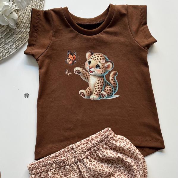 Bügelbild süßes Leo-Mädchen spielend