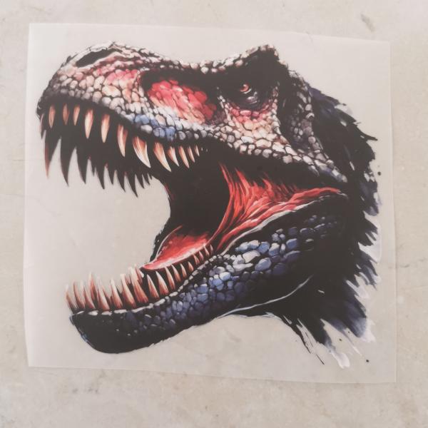 Bügelbild Dinokopf rot