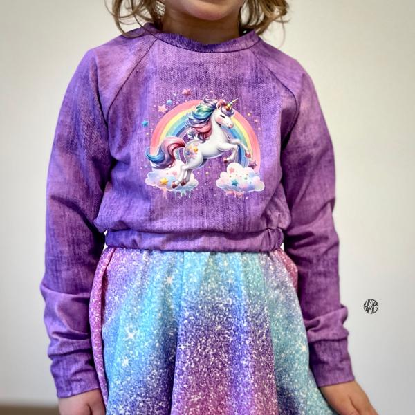 Bügelbild Einhorn springt vor Regenbogen