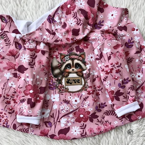 Bügelbild Waschbär mit Haarband hält Schild