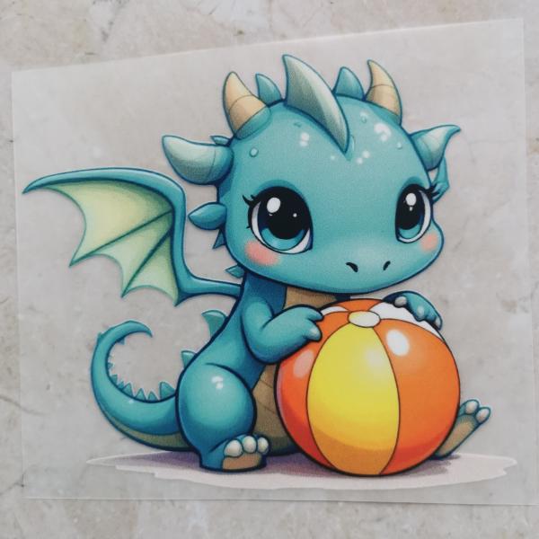 Bügelbild blauer Drache Wasserball