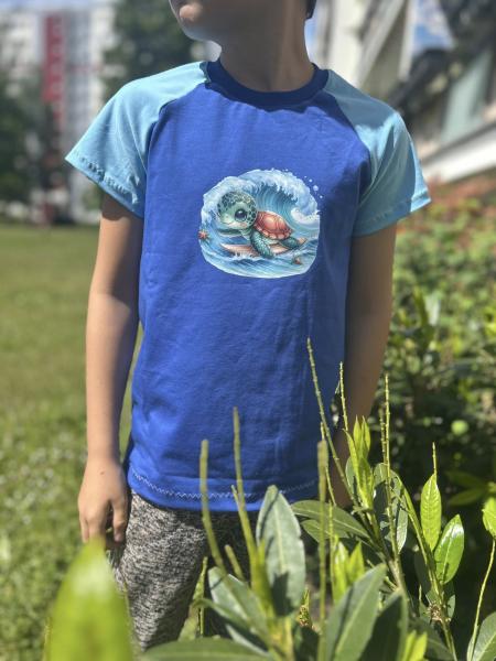 Bügelbild süße Sommerschildi surfend