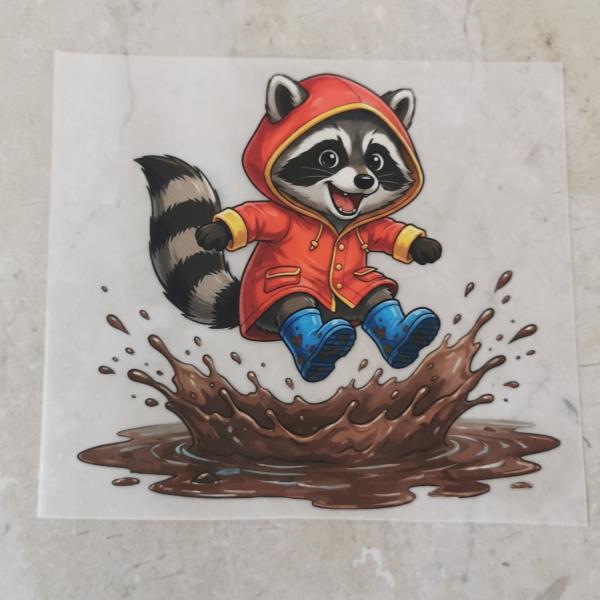 Bügelbild Pfützenwaschbär springend