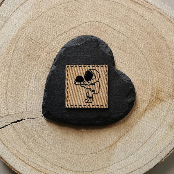 Label Astronaut mit Raumschiff